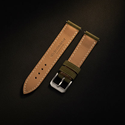 Wichtelmänner Olive Green leather watch strap showing the embossed leather lining and keeper